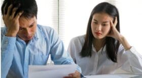 Couple frustrated filling out Form I-824